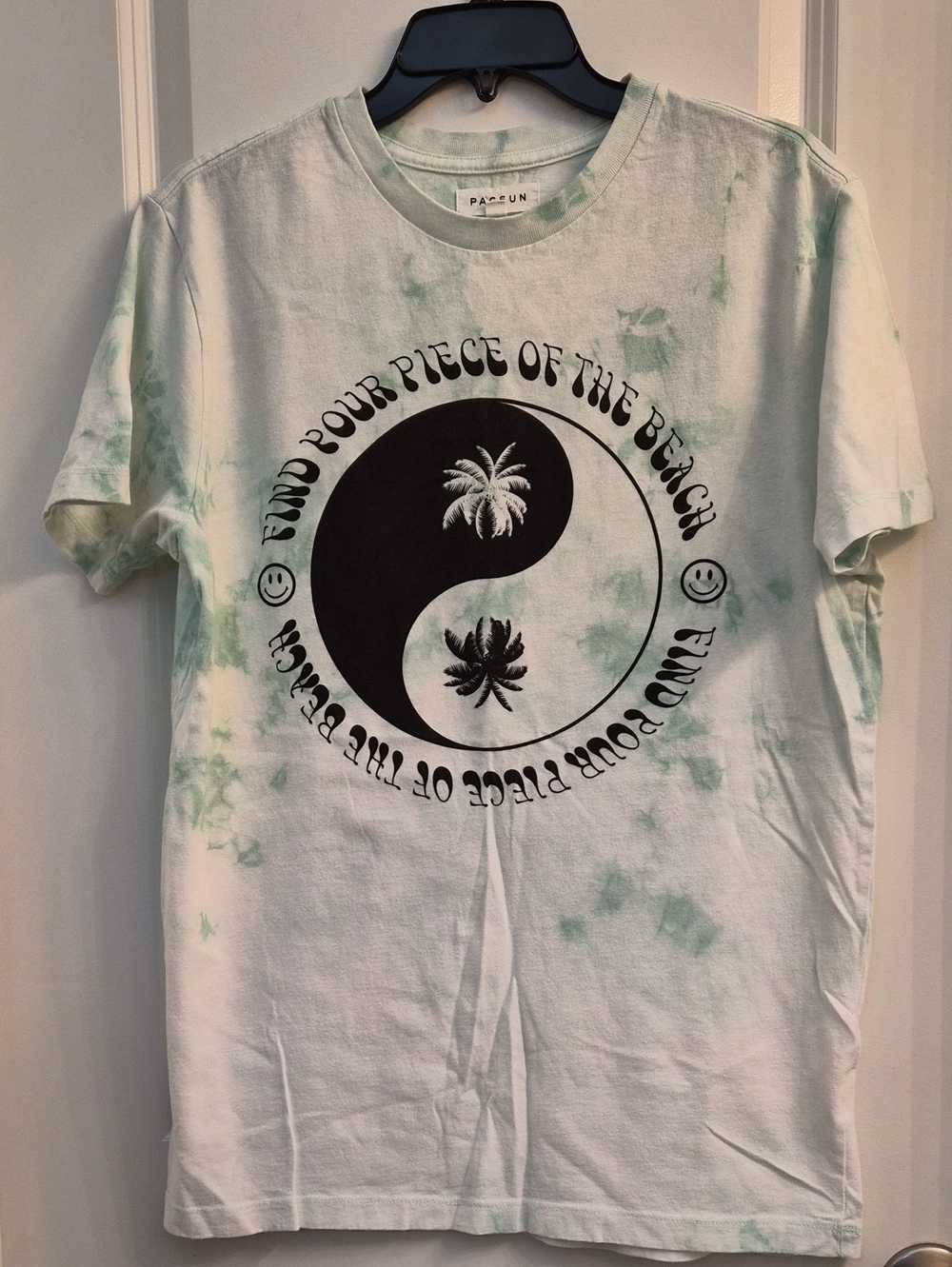 PacSun Mint Green Tie-Dye Short Sleeve Tee with Black Yin-Yang Palm Graphic.